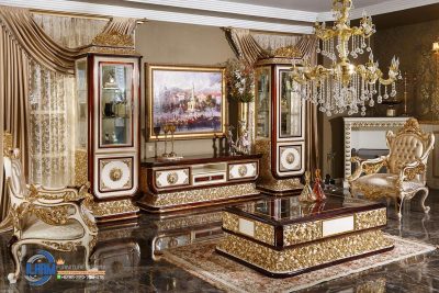 bufet TV kayu jati, bufet TV mewah klasik, bufet TV ukir duco gold, bufet ukiran emas jepara, furnitur ruang tamu klasik, ILHAM Furniture Jepara, luxury furniture indonesia, mebel klasik mewah, perabotan ukiran klasik, set lemari hias dan bufet TV,Set Bufet TV Mewah Klasik Ukiran Emas – Elegansi Abadi dari ILHAM Furniture
